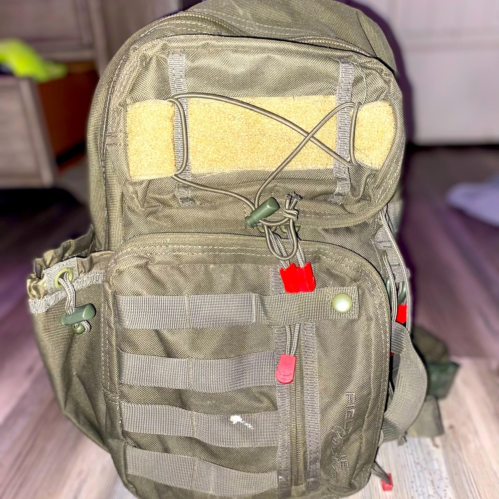 Army green tactical back pack.